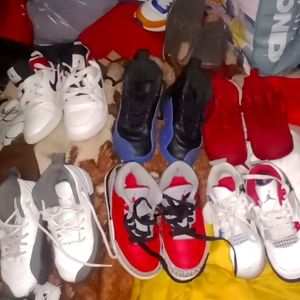 6 Pairs of Jordans Size 11C little boys in great condition Retail $900.